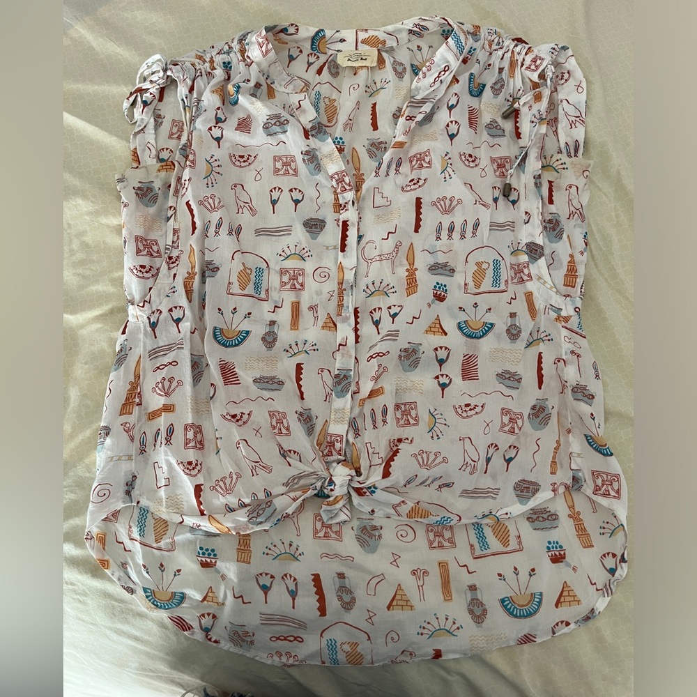 Anthropologie top.  Lightweight 100% cotton. Has a fun, different design
